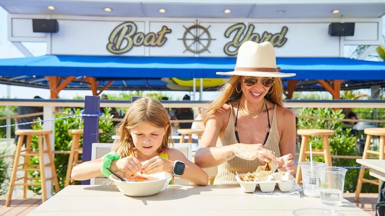 Gisele Leib and Robyn Soberg enjoy food after the beach...