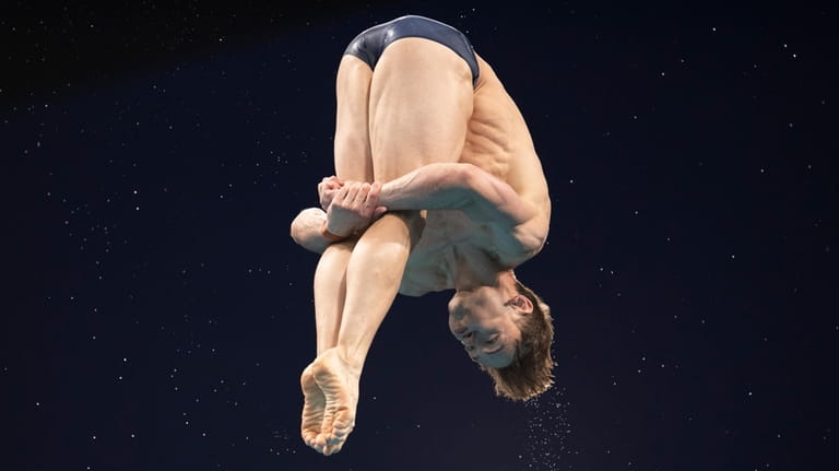 Britain's Tom Daley competes during the men's synchronized 10-meter platform...