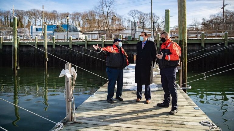 Senior Harbormaster Fred Uvena, Huntington Supervisor Chad Lupinacci and Dom Spada,...