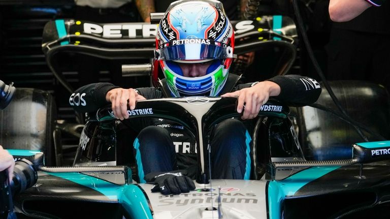 Mercedes driver Andrea Kimi Antonelli of Italy enters his car...