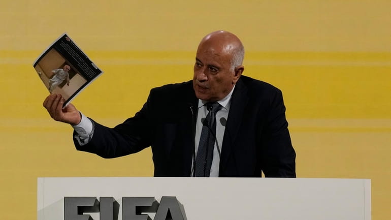 Palestinian Football Association leader Jibril Rajoub delivers his speech during...