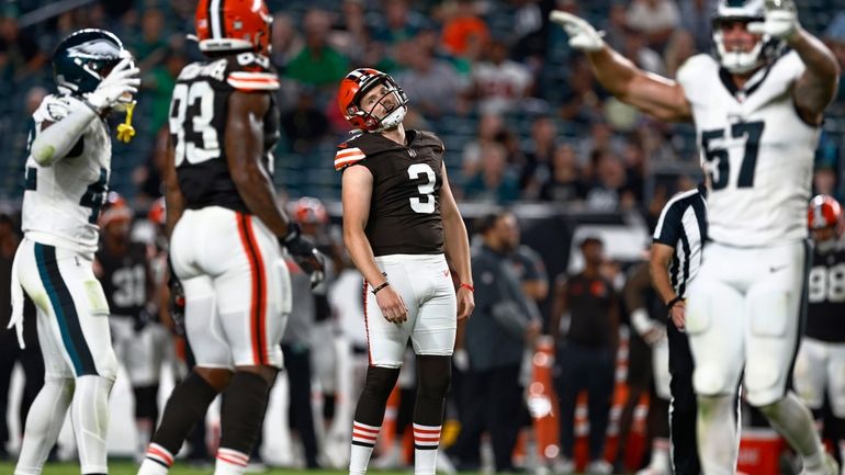 Cleveland Browns place-kicker Cade York (3) reacts after missing a...