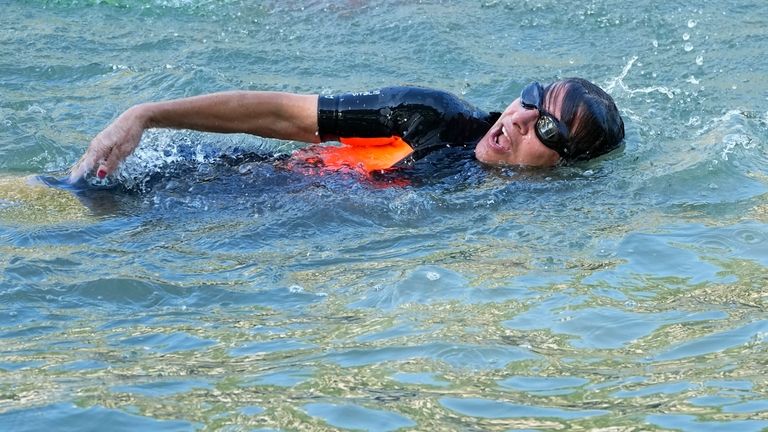 Paris Mayor Anne Hidalgo swims in the Seine river Wednesday,...