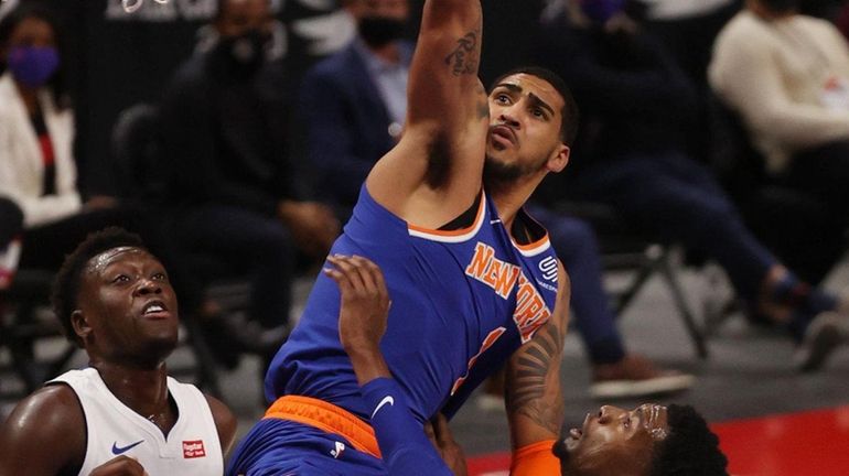 Obi Toppin of the Knicks takes a shot over Jahlil...