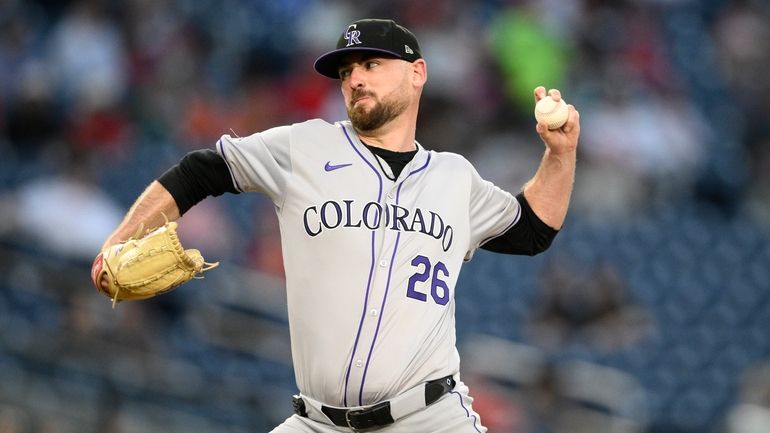 Colorado Rockies starting pitcher Austin Gomber throws during the fourth...