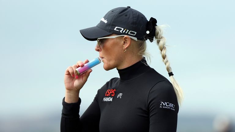 England's Charley Hull vapes on her way to the 3rd...