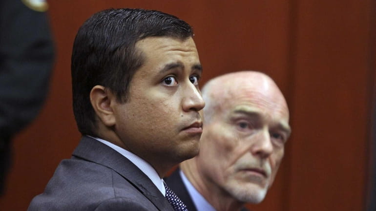 In this file photo, George Zimmerman, left, and attorney Don...