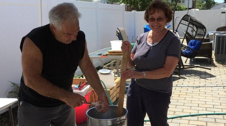 Christine McKnight of East Northport and cousin Ray Torre of...