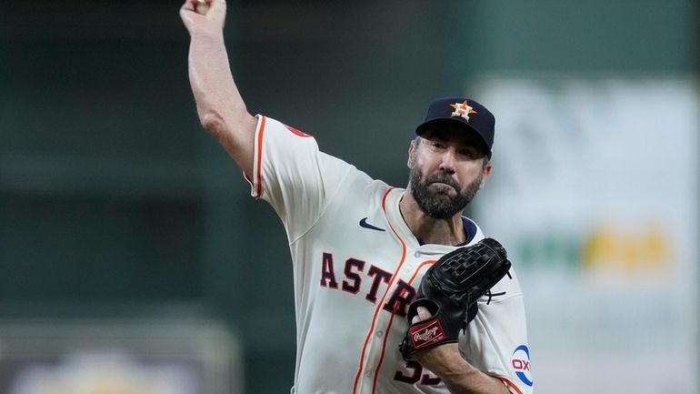 Houston Astros starting pitcher Justin Verlander throws during a simulated...