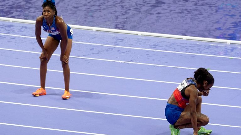 Sha'carri Richardson, right, and teammate Melissa Jefferson, both of the...