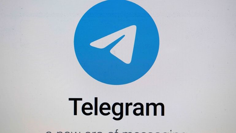 The logo for the Telegram messaging app is seen on...