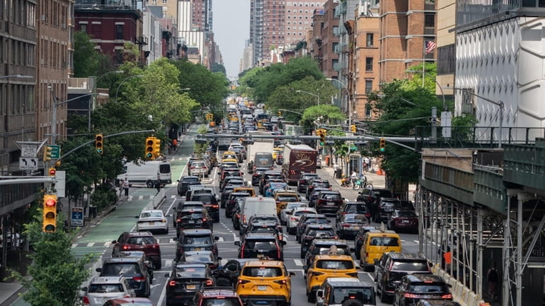 Traffic on 10th Avenue in Manhattan. The governor's decision to press...
