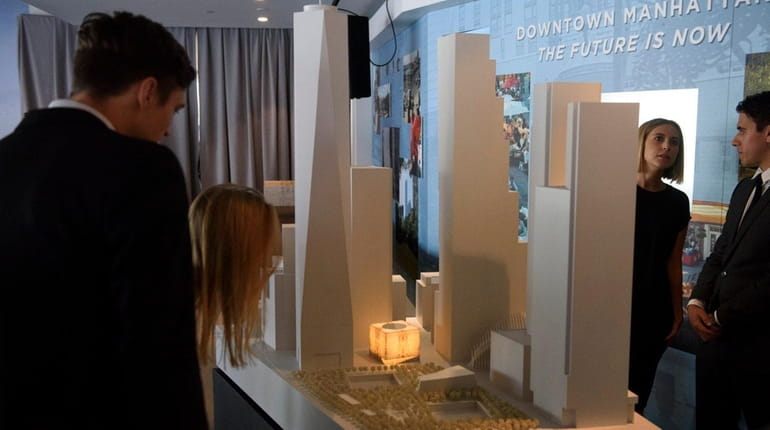 People look at a model of the Ronald O. Perelman...