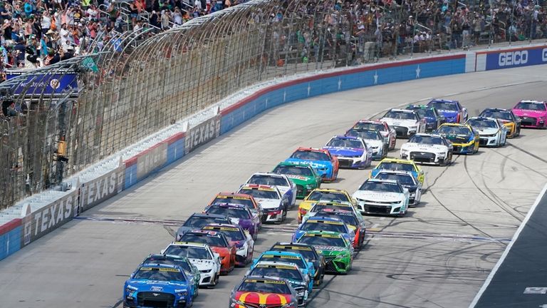 The green flag starts a NASCAR Cup Series auto race...