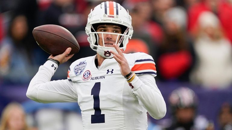 Auburn quarterback Payton Thorne looks to throw a pass during...