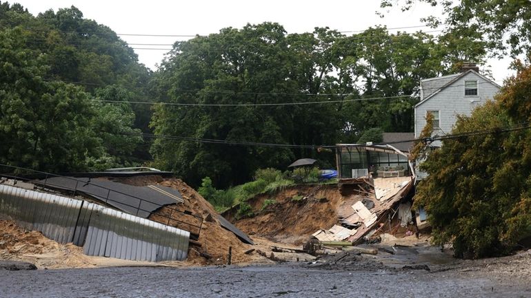 Heavy rains damaaged Mill Pond Dam at Harbor Road and...