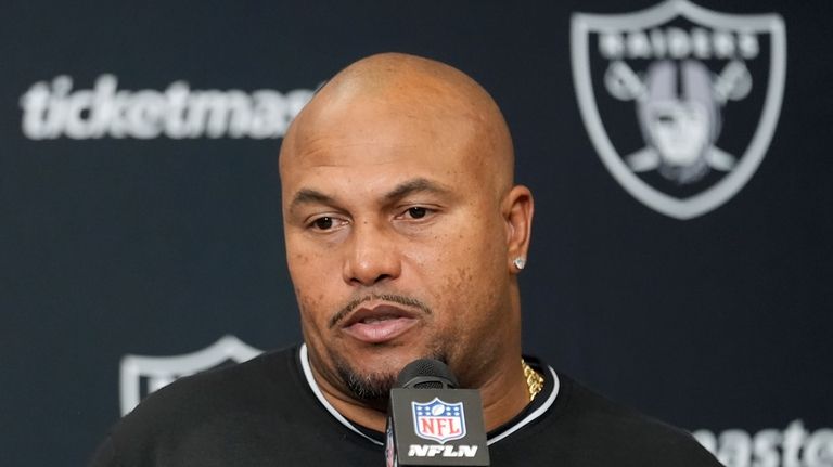 Las Vegas Raiders head coach Antonio Pierce speaks at a...