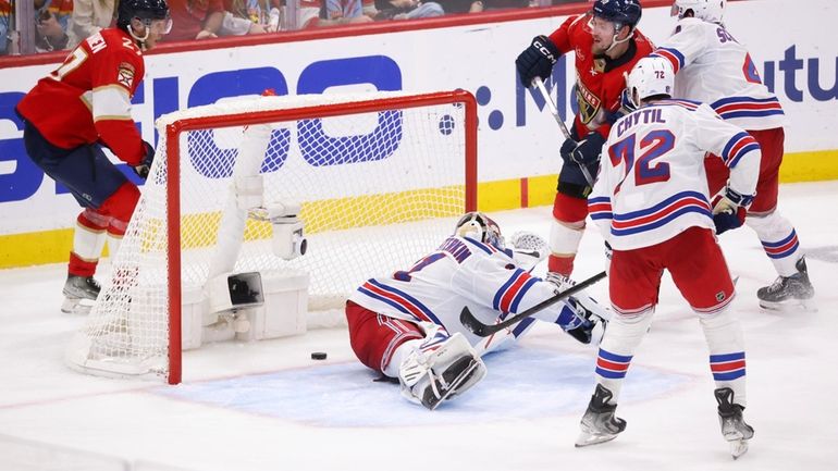 Vladimir Tarasenko #10 of the Florida Panthers scores a goal...