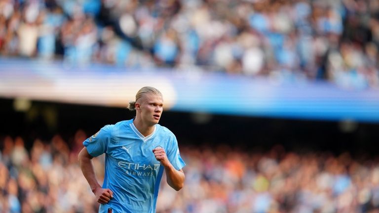 Manchester City's Erling Haaland runs during the English Premier League...