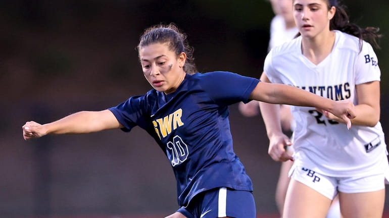 Bella Sweet passes ball into Bayport-Blue Point zone, but her...
