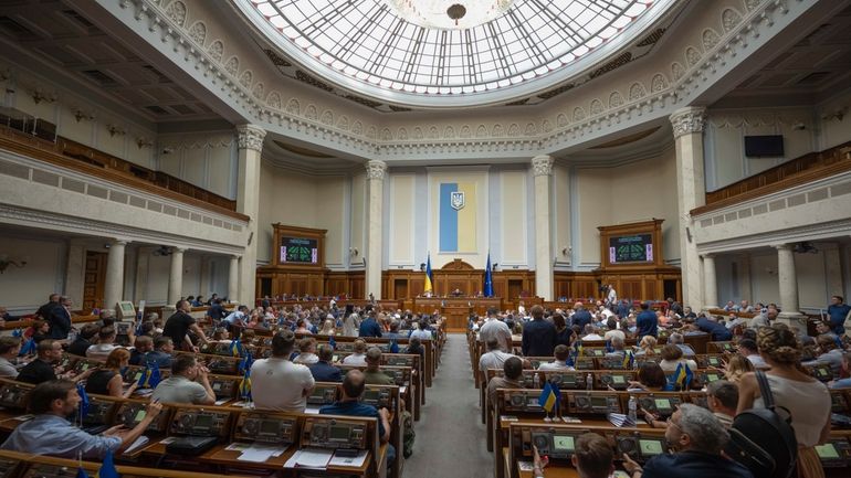 In this photo provided by the Ukrainian Parliament Press Office,...