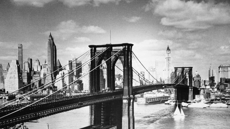 A 1939 T view of the Brooklyn Bridge with the...