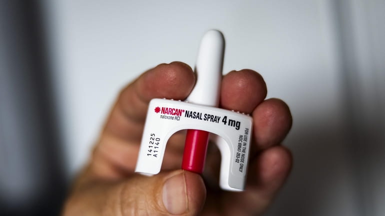 A photo illustration of Narcan nasal spray, which will be available...