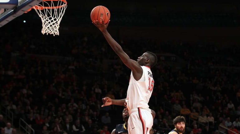 Sir'Dominic Pointer #15 of the St. John's Red Storm sends...