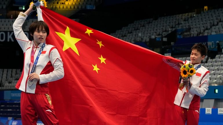 Chen Yuxi of China, left, silver medal and Quan Hongchan...