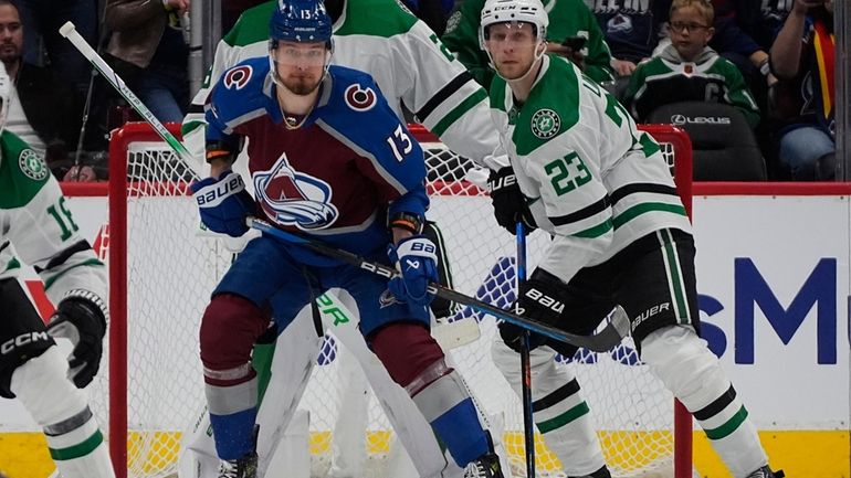 Colorado Avalanche right wing Valeri Nichushkin, left, and Dallas Stars...