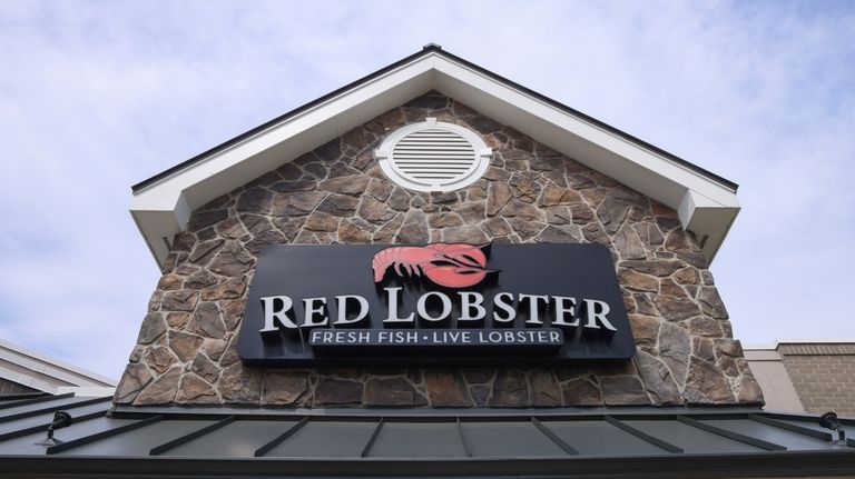 Signage at a Red Lobster restaurant, May 20, 2024, in...