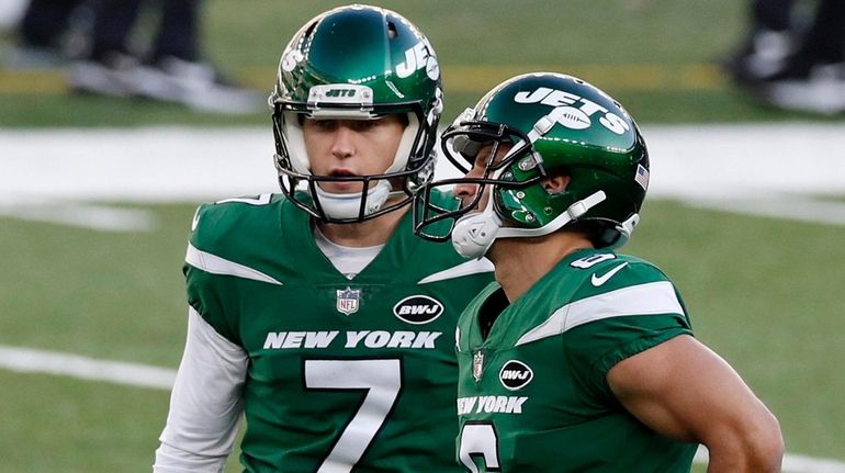 Braden Mann of the Jets reacts with teammate Sergio Castillo after Santos...