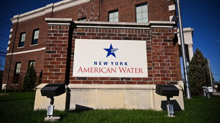 The sign in front of the New York American Water...