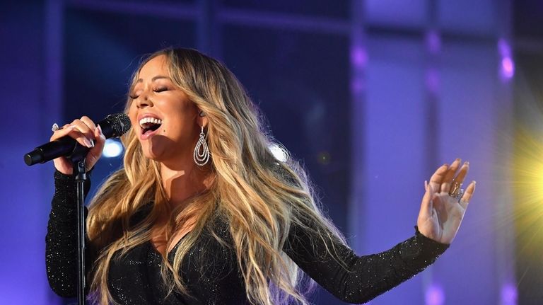 Mariah Carey performs at the 2019 Billboard Music Awards in...