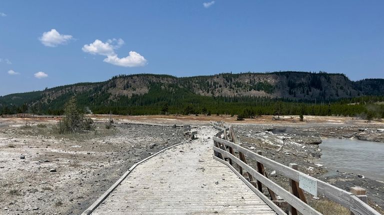 In this photo released by the National Park Service, debris...