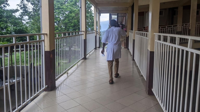 Heath worker walks in the Mbingo Baptist Hospital in Mutengene,...