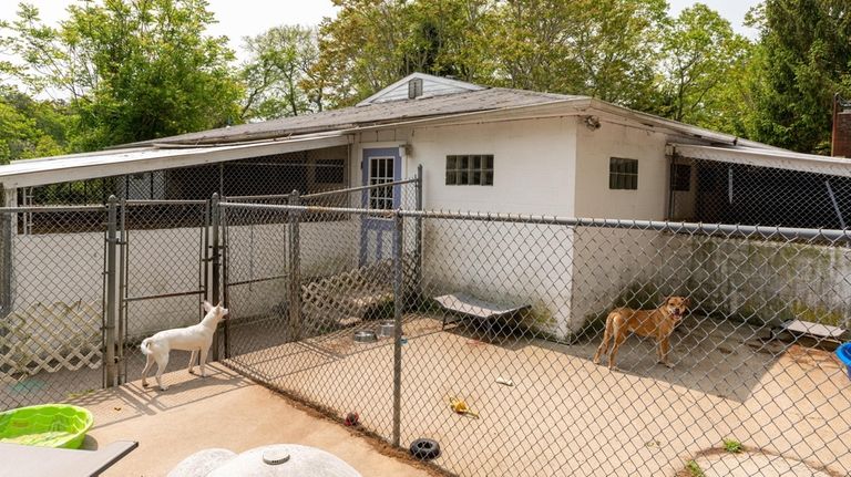 One of two buildings slated to be demolited and rebuilt at...