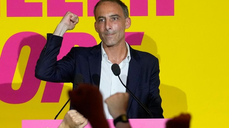 French Socialist Party lead candidate Raphael Glucksmann clenches his fist...