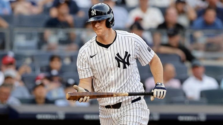 DJ LeMahieu #26 of the New York Yankees strikes out...