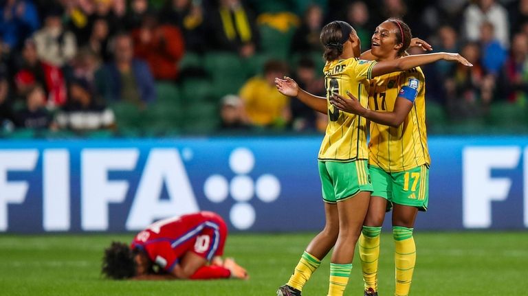 Jamaica's Allyson Swaby, right, and Tiernny Wiltshire celebrate at the...