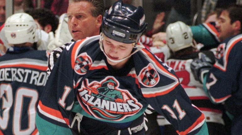 A fisherman wearing the 1995 New York Islanders jersey.