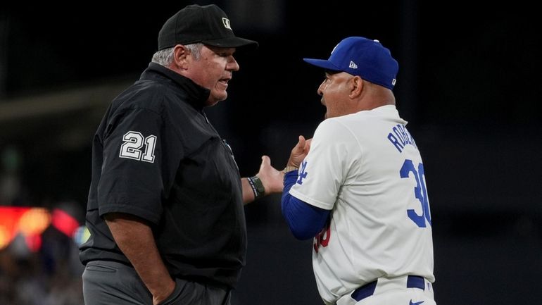 Los Angeles Dodgers manager Dave Roberts is ejected during the...