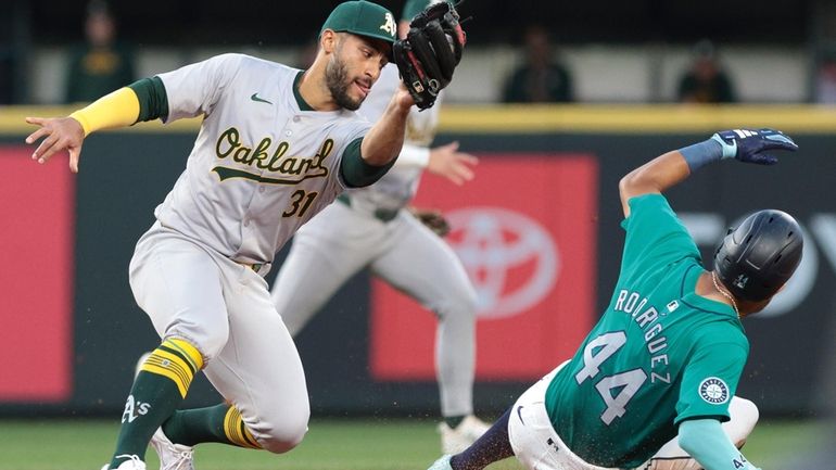 Oakland Athletics second baseman Abraham Toro (31) goes to tag...