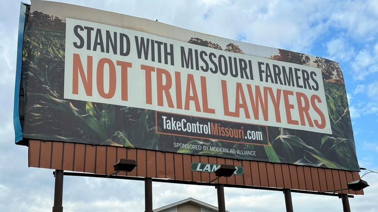 A billboard supporting legislation that would provide legal protection to...