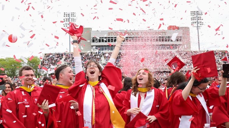 Stony Brook University graduates from the class of 2024 celebrate...