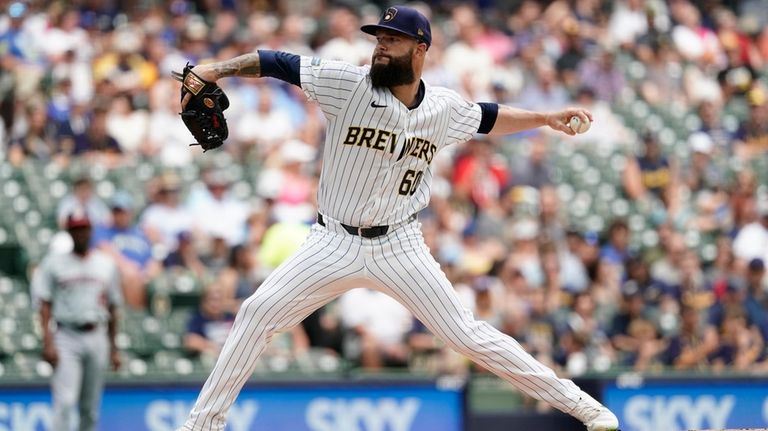 Milwaukee Brewers' Dallas Keuchel pitches during the first inning of...