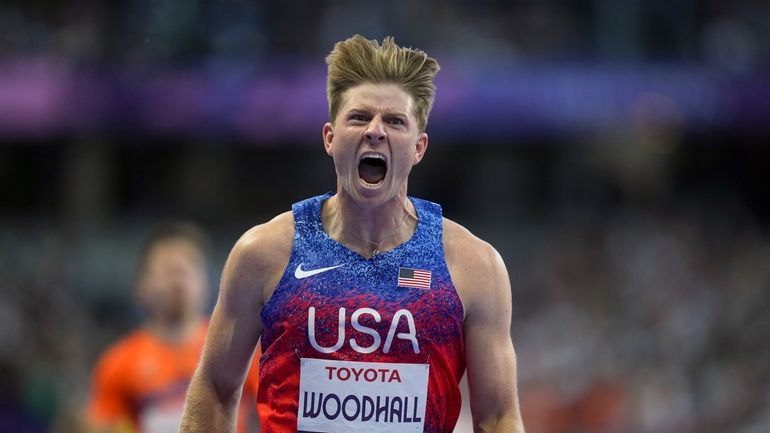 Hunter Woodhall from the U.S. wins the men's 400 m....