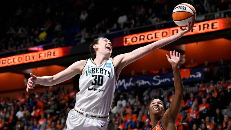 New York Liberty forward Breanna Stewart reaches for a rebound...