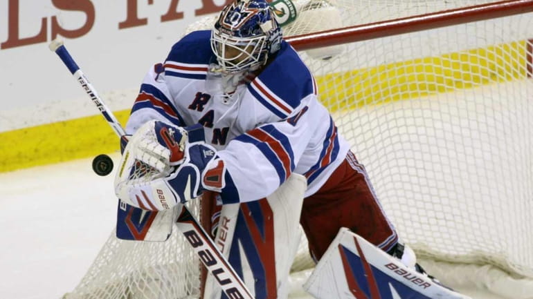 New York Rangers goalie Henrik Lundqvist (30), of Sweden, turns...