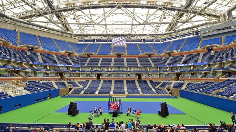 A view of Arthur Ashe Stadium with the roof closesd...